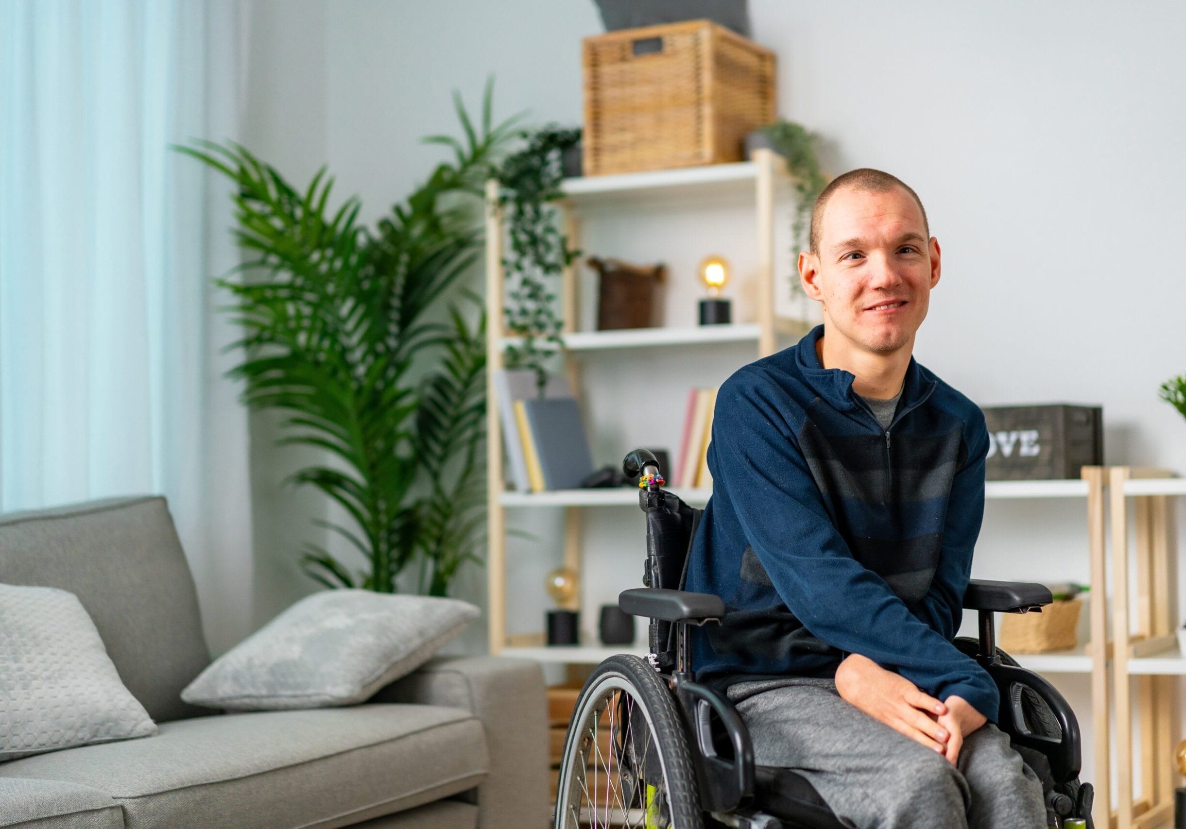 Portrait,Of,A,Cheerful,Disabled,Man,In,Wheelchair,Smiling,At Portrait,Of,A,Cheerful,Disabled,Man,In,Wheelchair,Smiling,At