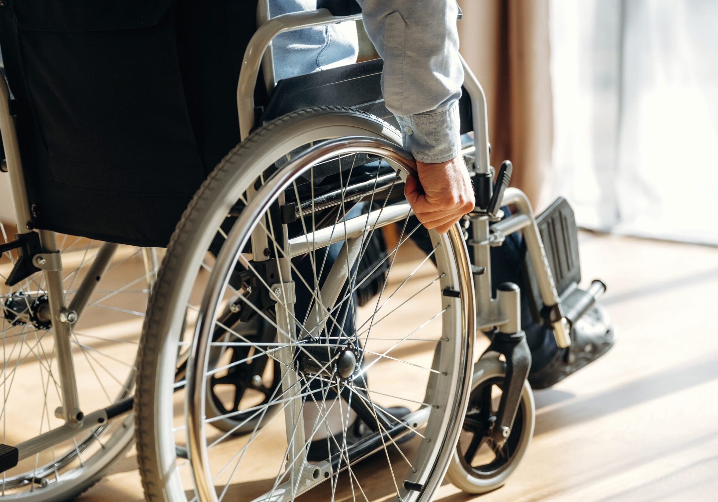 Person,Wearing,A,Gray,Long-sleeve,Shirt,Holds,The,Wheel,Of Person,Wearing,A,Gray,Long-sleeve,Shirt,Holds,The,Wheel,Of